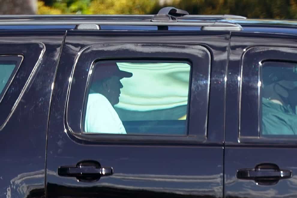 Donald Trump arriving at his golf course