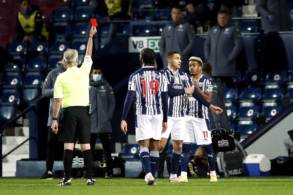Jake Livermore is shown a red card