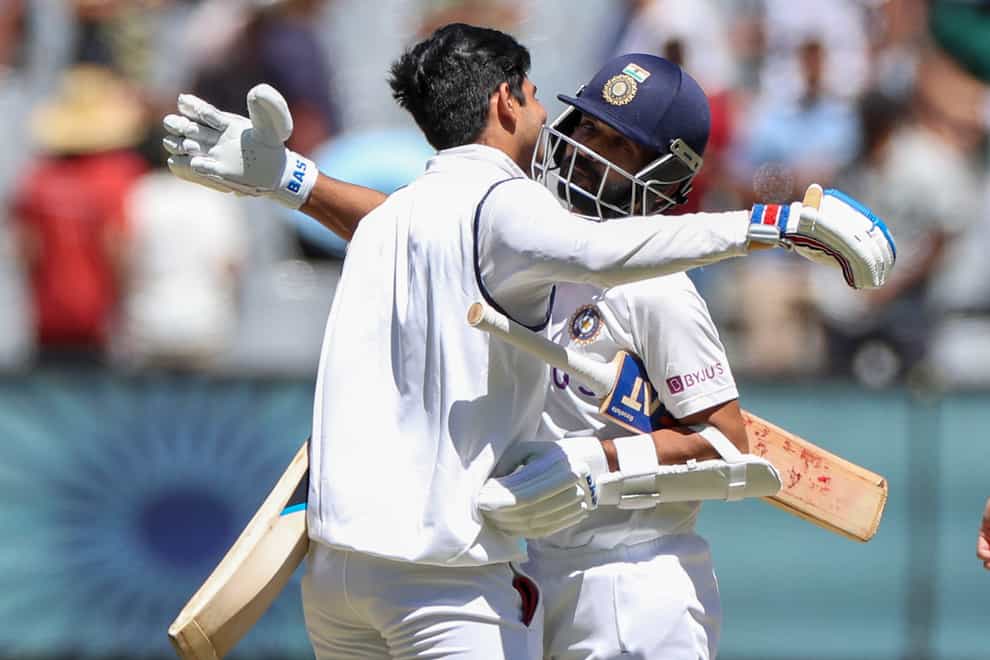 India’s Ajinkya Rahane, right, and teammate Shubman Gill celebrate winning the second Test against Australia by eight wickets at the MCG to level the series at 1-1
