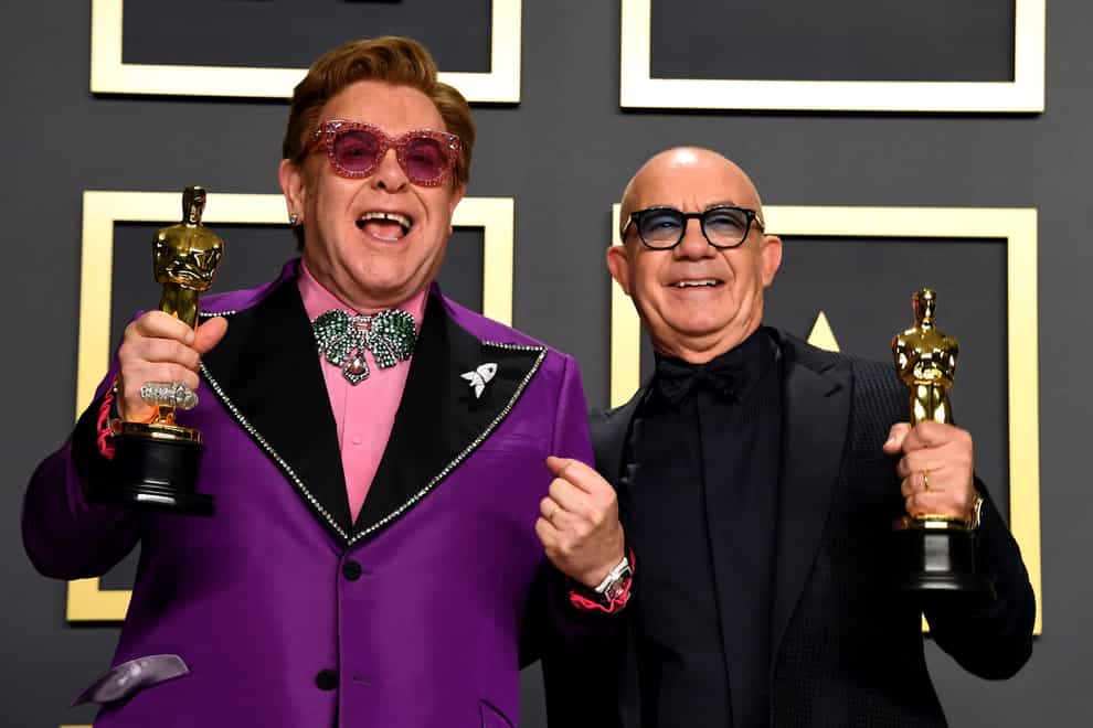 Sir Elton John and Bernie Taupin with their best original song Oscar at the 92nd Academy Awards