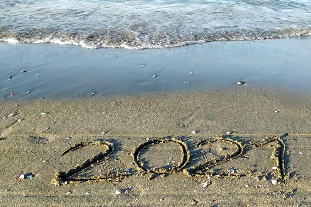 welcome the new year on the beach (iStock/PA)