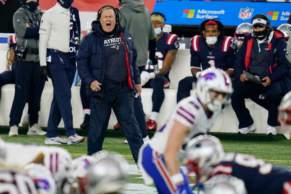 New England Patriots head coach Bill Belichick shouts from the sideline in the first half