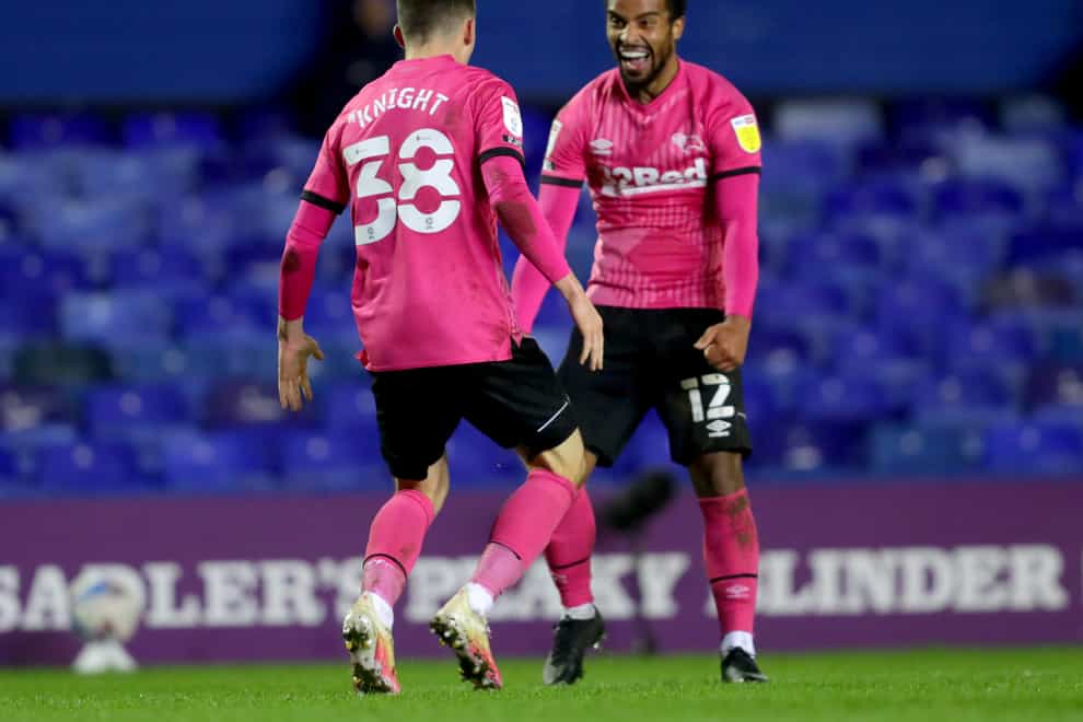 Derby’s Jason Knight, left, celebrates scoring his side’s fourth goal at St Andrew's
