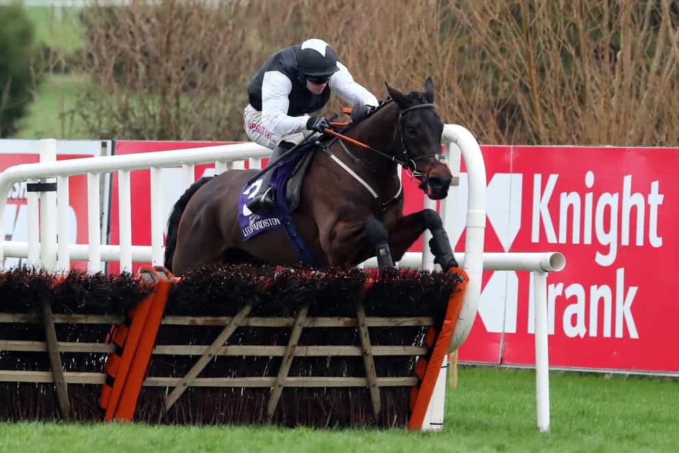Flooring Porter clears the last on his way to winning the Christmas Hurdle