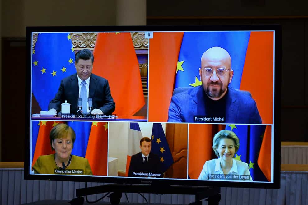 A screen displays Chinese president Xi Jinping, top left, European Council president Charles Michel, top right, European Commission president Ursula von der Leyen, bottom right, French president Emmanuel Macron, bottom centre, and German chancellor Angela Merkel during an EU-China leaders’ meeting video conference at the European Council headquarters in Brussels