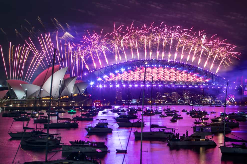 <p>Fireworks explode over the Sydney Opera House and Harbour Bridge as New Year celebrations begin in Australia&nbsp;</p>