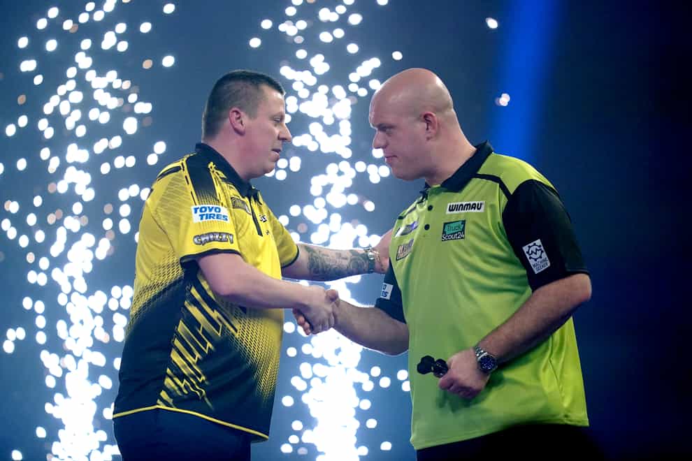 Dave Chisnall (left) is through to the PDC World Championship semi-finals for the first time following his victory over Michael Van Gerwen (right) (John Walton/PA).