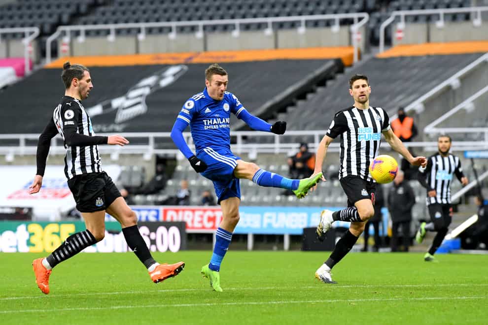 Jamie Vardy, centre, threatens to add to the scoring during Leicester's win at Newcastle