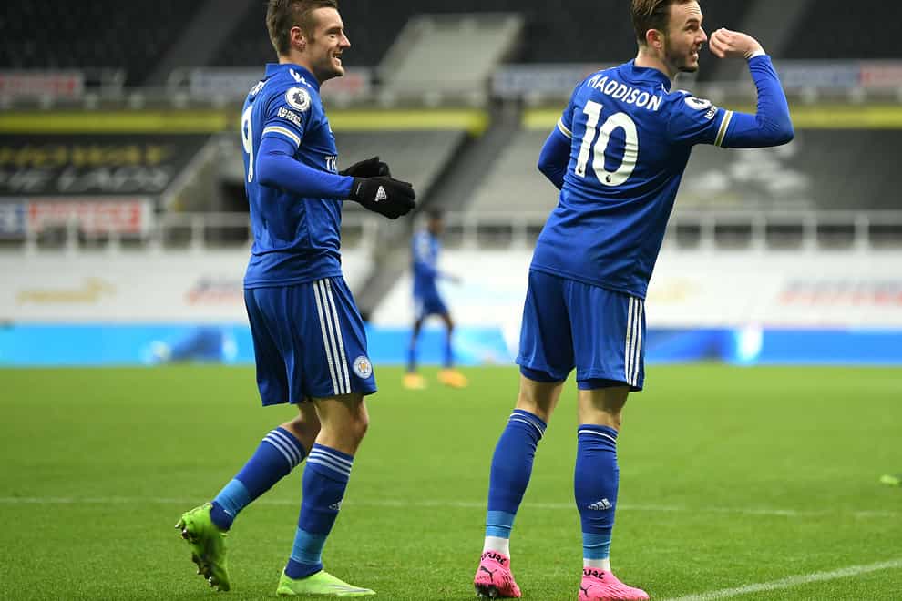 Leicester’s James Maddison (right) celebrates his goal at Newcastle with provider Jamie Vardy