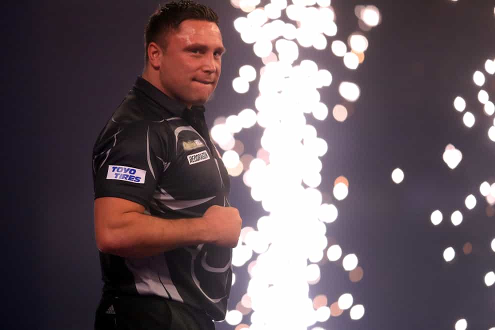 Gerwyn Price celebrates winning the final against Gary Anderson on day sixteen of the William Hill World Darts Championship