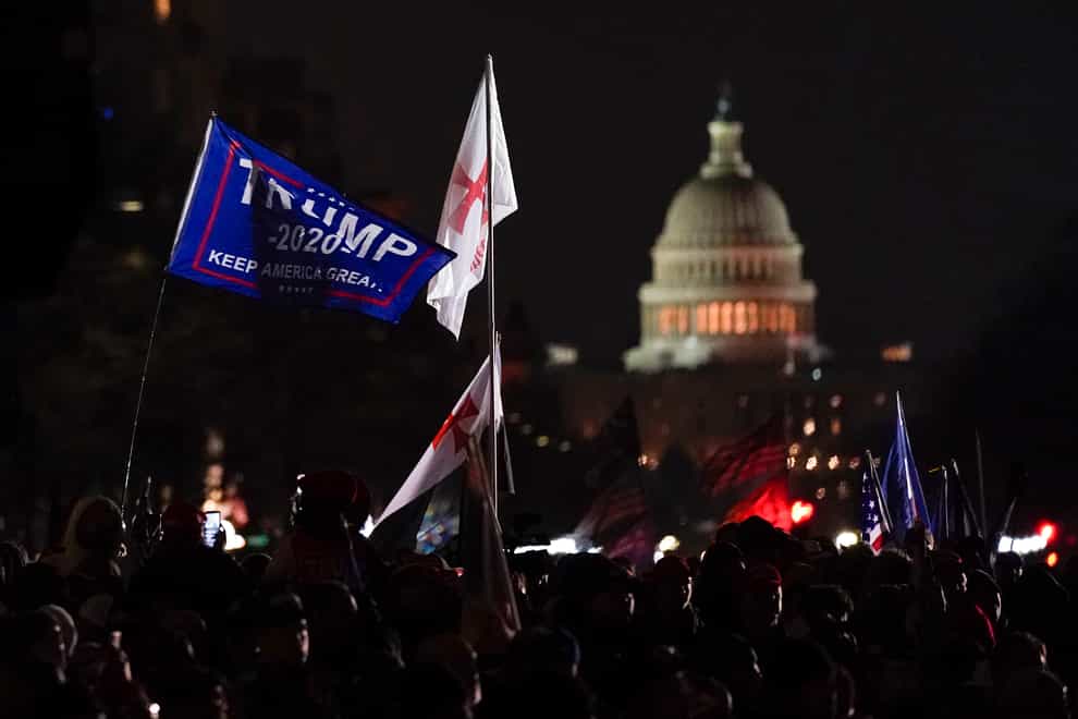 People attend a rally at Freedom Plaza in support of President Donald Trump