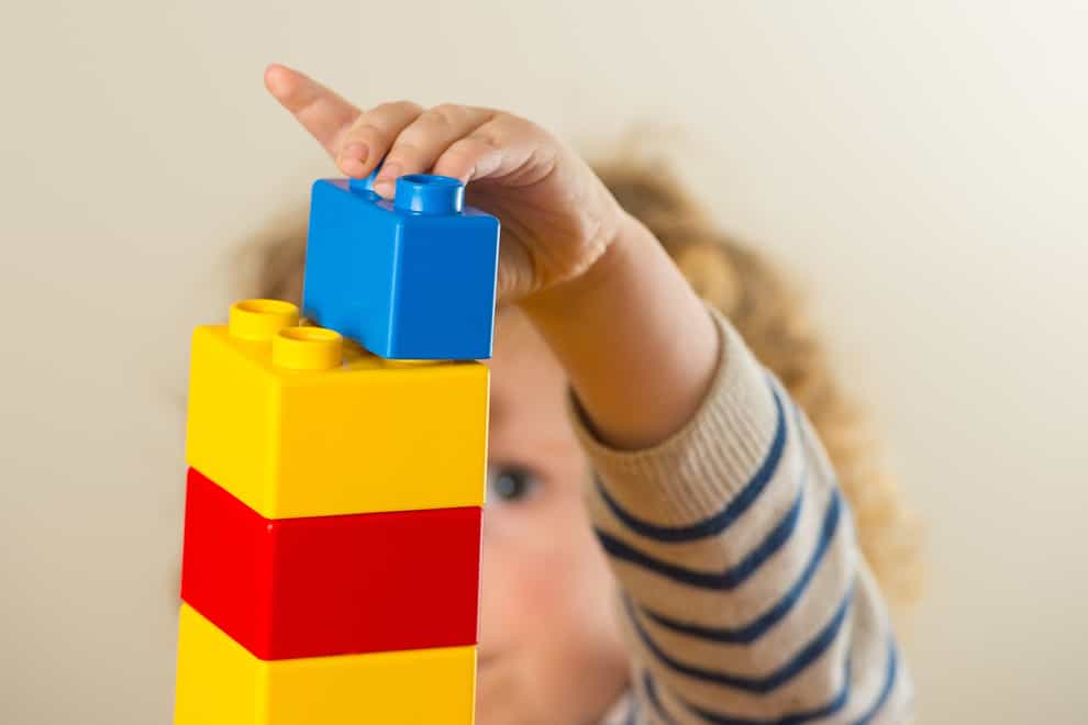 A child playing with building blocks