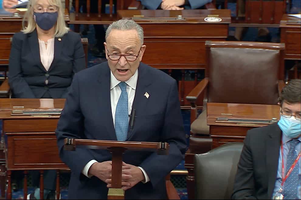 Senate Minority Leader Chuck Schumer speaks as the Senate reconvenes after protesters stormed into the US Capitol