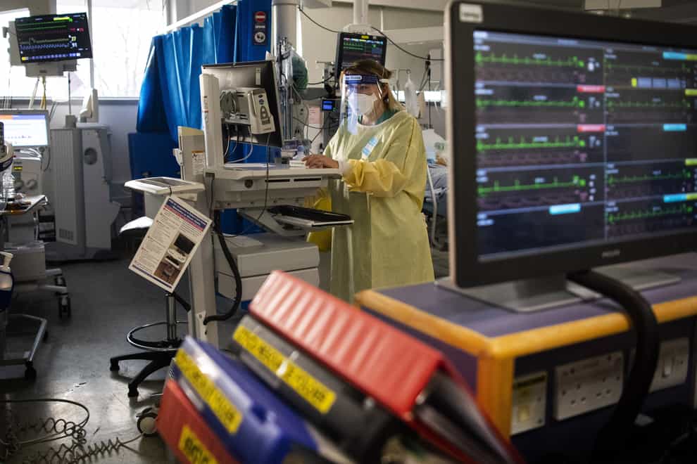 A nurse works on a computer in the Intensive Care Unit at St George’s Hospital in Tooting, London