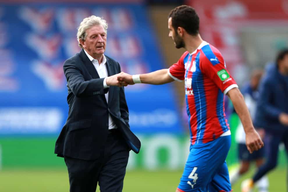 Crystal Palace captain Luka Milivojevic, right, with manager Roy Hodgson