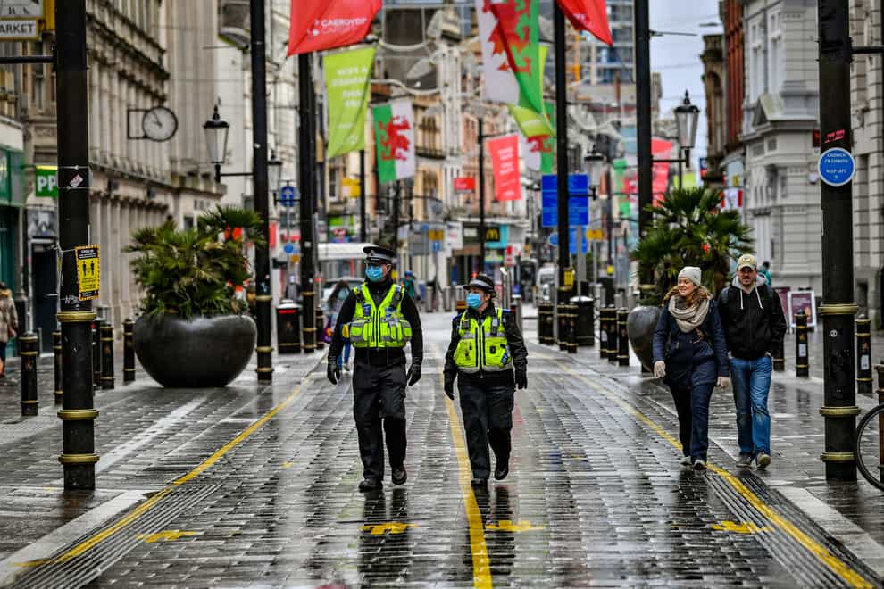 Police patrol the central shopping areas of Cardiff