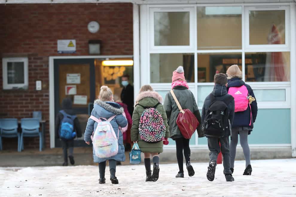 Pupils arriving at school