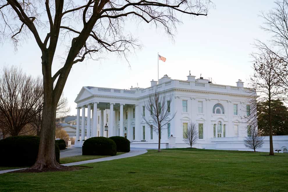 An American flag flies over the White House (Patrick Semansky/AP)