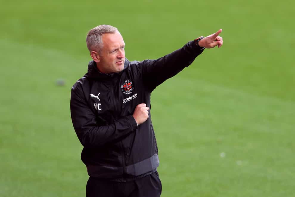 Blackpool head coach points on the touchline