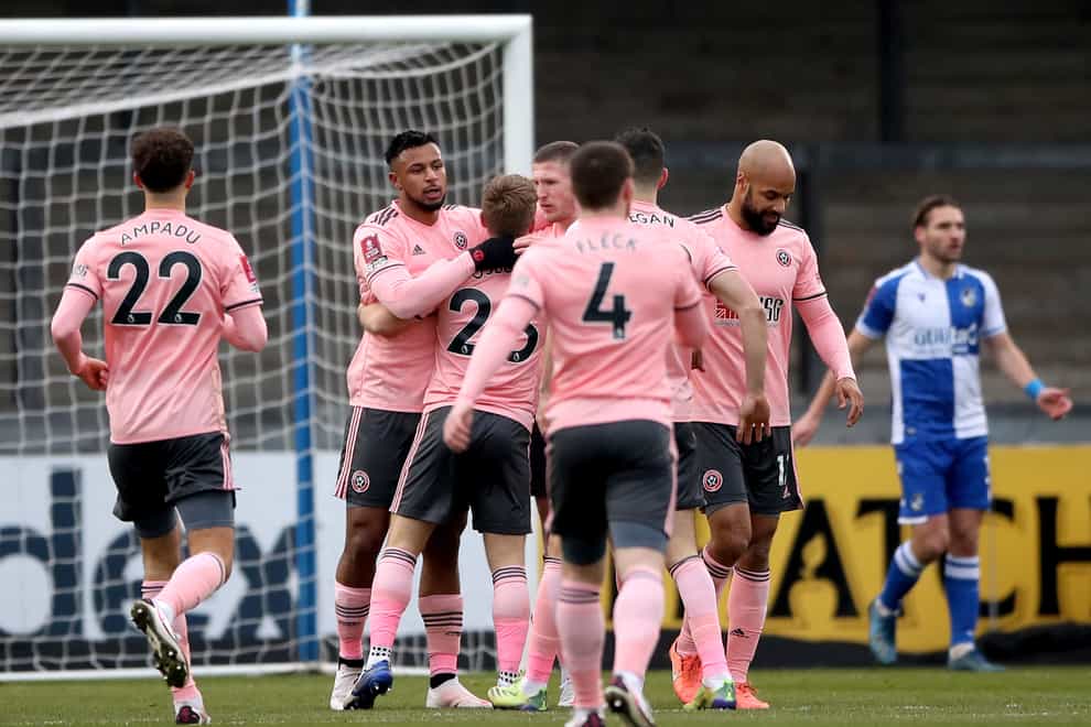 Sheffield United players celebrate taking the lead in their FA Cup win at Bristol Rovers