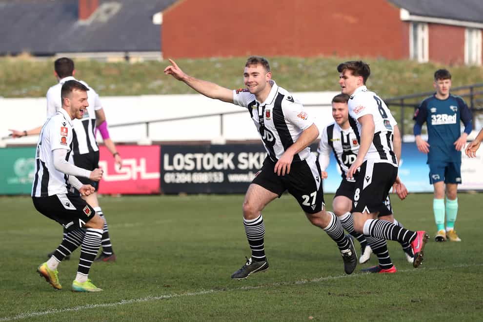 Connor Hall (centre) was on target as Chorley reached the FA Cup fourth round
