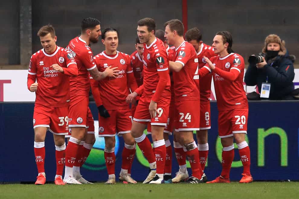 Crawley Town celebrate Jordan Tunnicliffe's third goal in a shock 3-0 FA Cup third round win over Premier League Leeds.