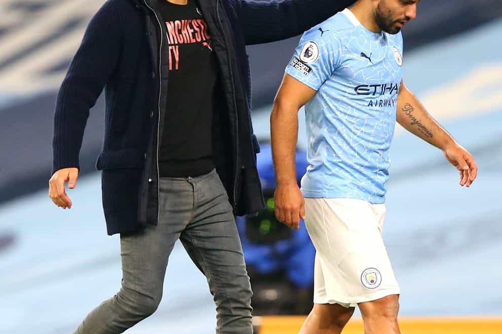 Manchester City manager Pep Guardiola and Sergio Aguero
