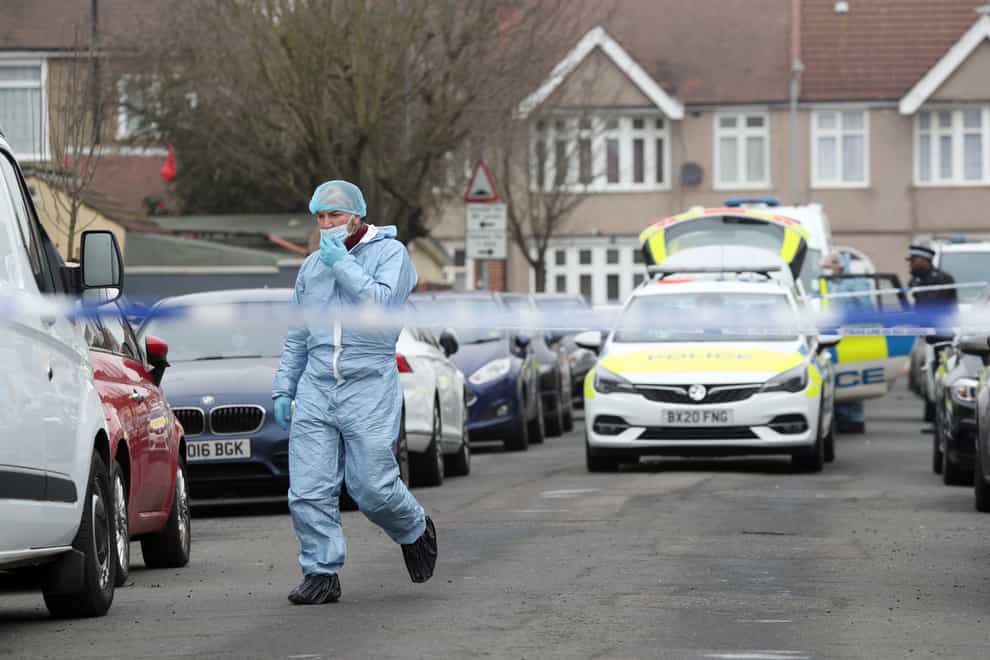 Forensic officers at the scene in Tavistock Gardens