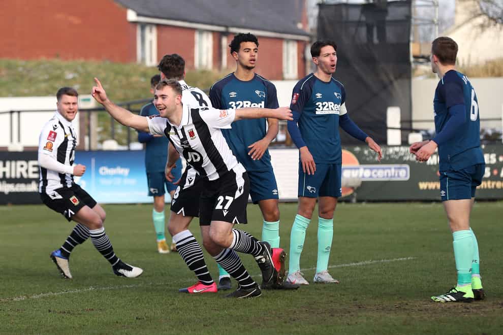 Chorley’s Connor Hall (second left) celebrates scoring the opening goal against Derby