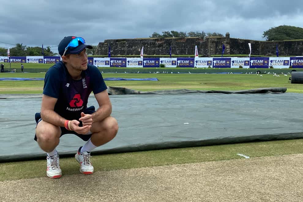 England captain Joe Root assesses the pitch in Galle.