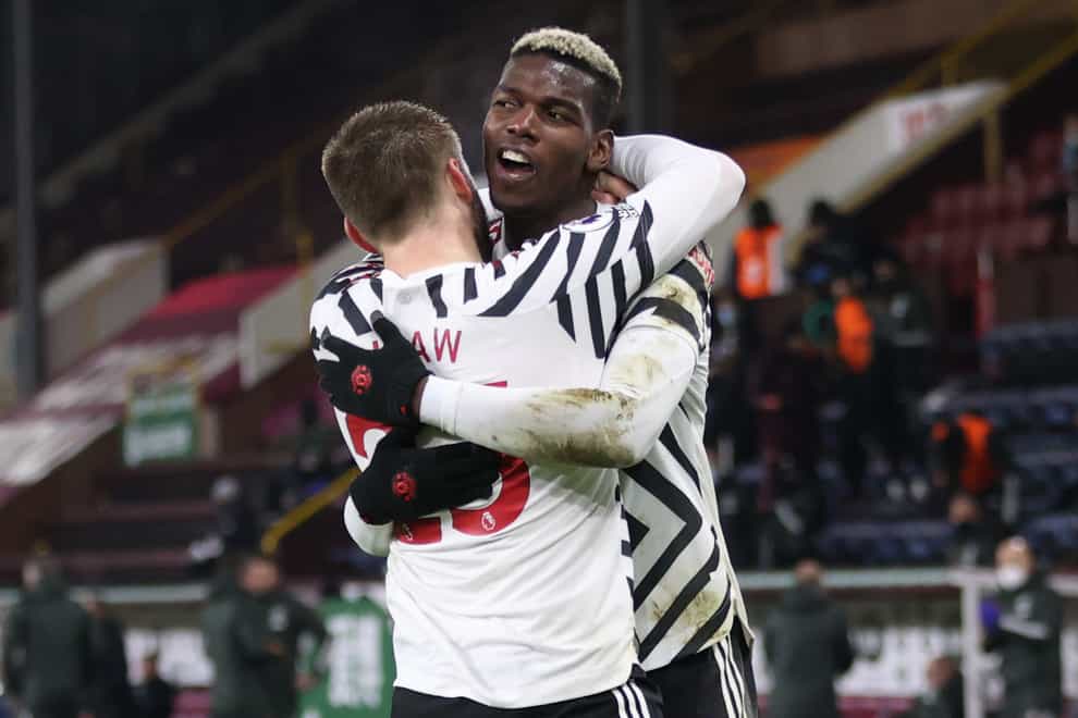 Paul Pogba, right, made the breakthrough at Turf Moor with a deflected volley