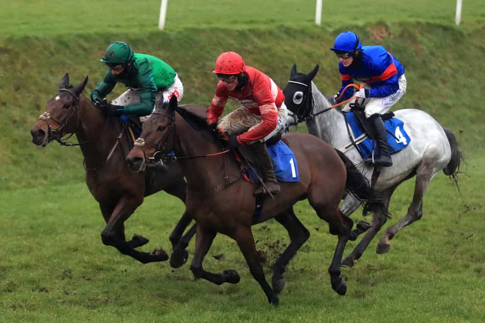 Zambella and Daryl Jacob (left, green) on their way to winning the Pertemps Network Mares’ Chase at Leicester Racecourse