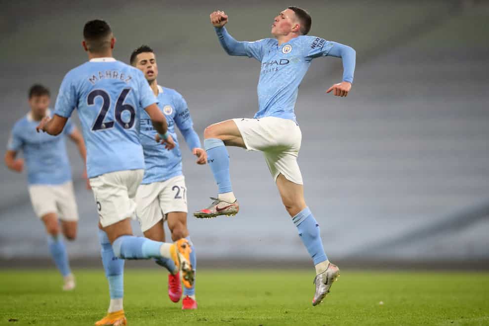 Phil Foden (right) continues to impress for Man City
