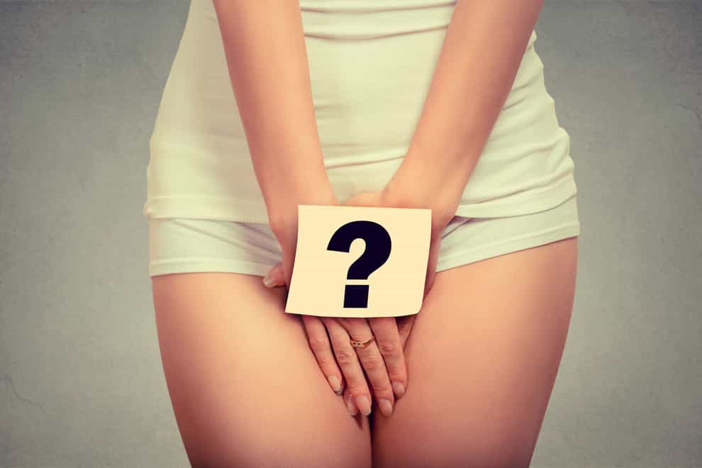 woman with question mark over underwear