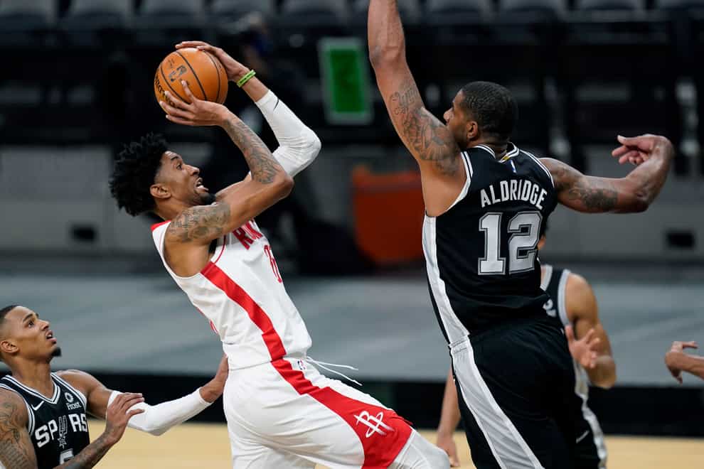 Houston Rockets center Christian Wood (35) shoots against San Antonio Spurs center LaMarcus Aldridge (12)