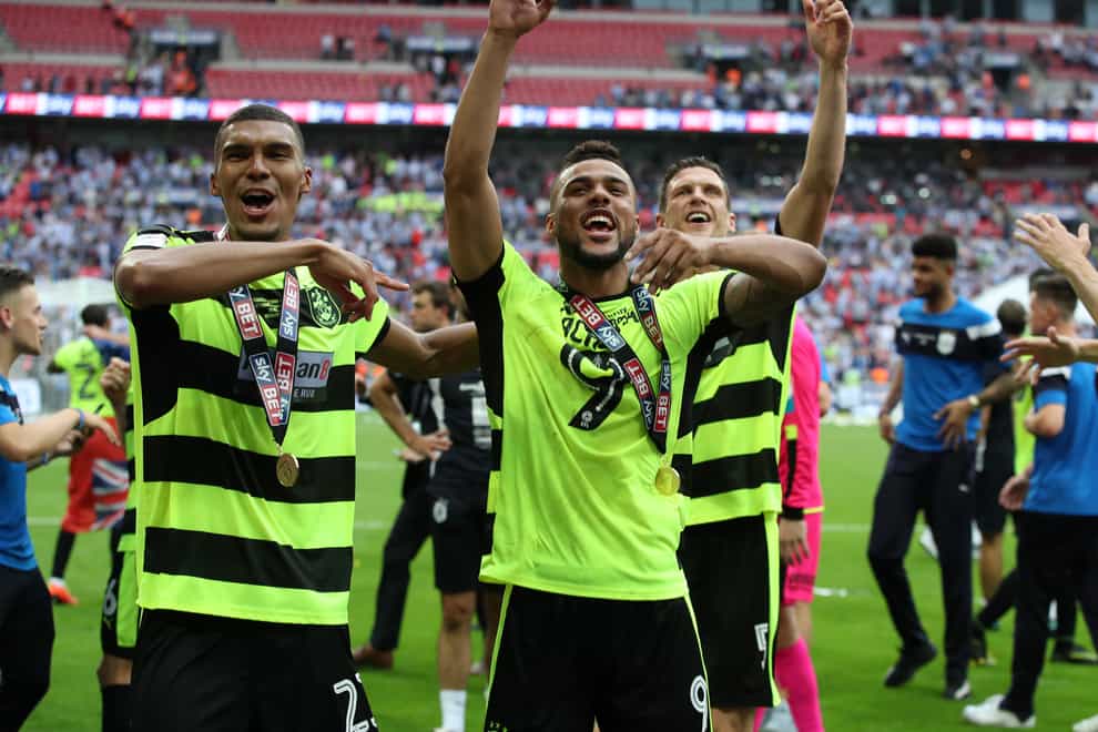 Collin Quaner (left) helped Huddersfield to play-off glory