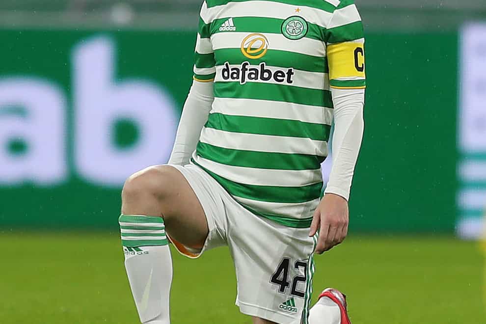 Callum McGregor takes a knee before kick-off