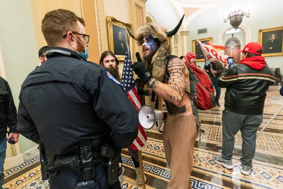 Supporters of President Donald Trump are confronted by US Capitol Police officers (Manuel Balce Ceneta/AP)