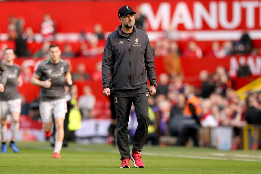 Liverpool manager Jurgen Klopp walks on the pitch at Old Trafford
