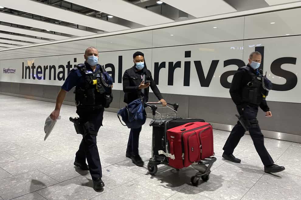 People arrive at Heathrow Airport