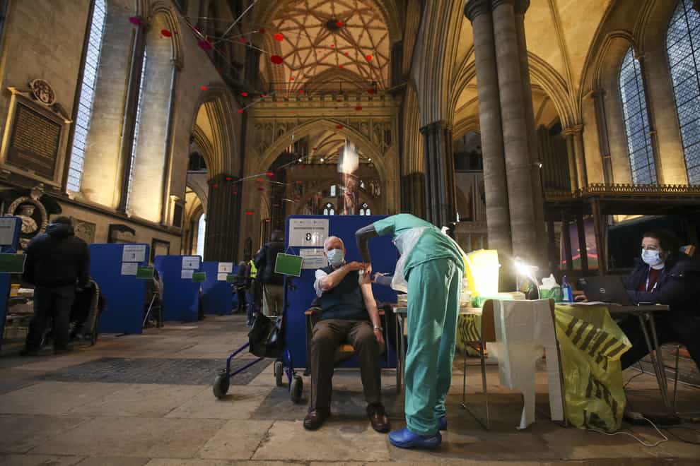 Ex-RAF Flight Sergeant Louis Godwin receives his Covid-19 vaccination at Salisbury Cathedral