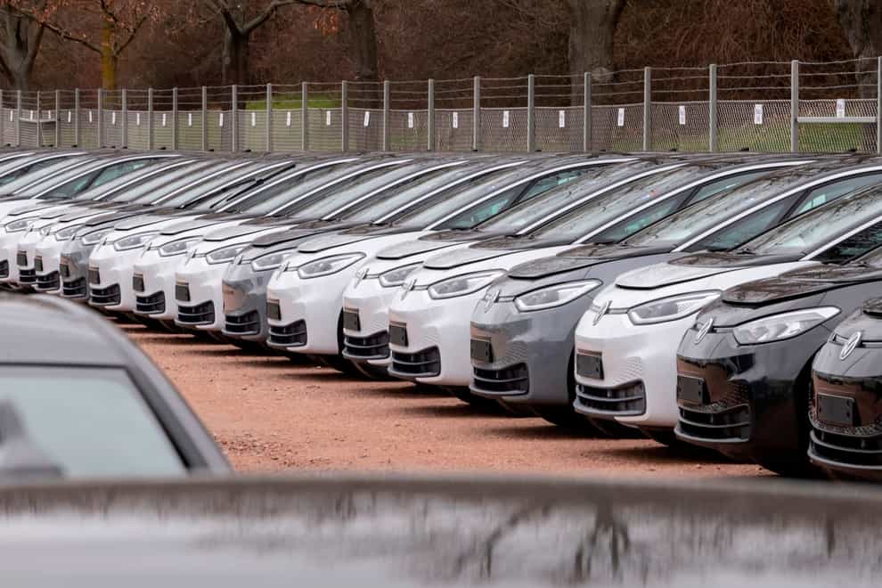 Cars stand at the factory area during a press tour at the plant of the German manufacturer Volkswagen AG ,VW, in Zwickau, Germany (Jens Meyer/AP)
