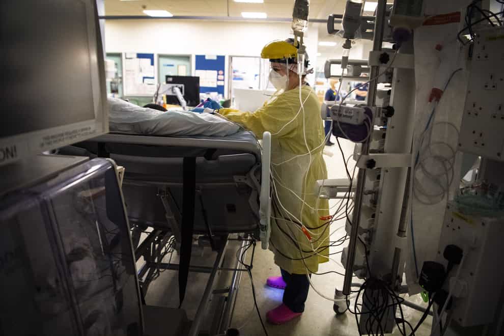 Nurse works on coronavirus patient