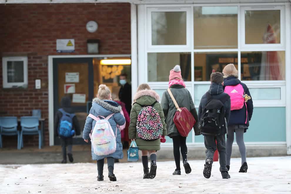 Pupils arriving at Manor Park School and Nursery in Knutsford, Cheshire (Martin Rickett/PA)