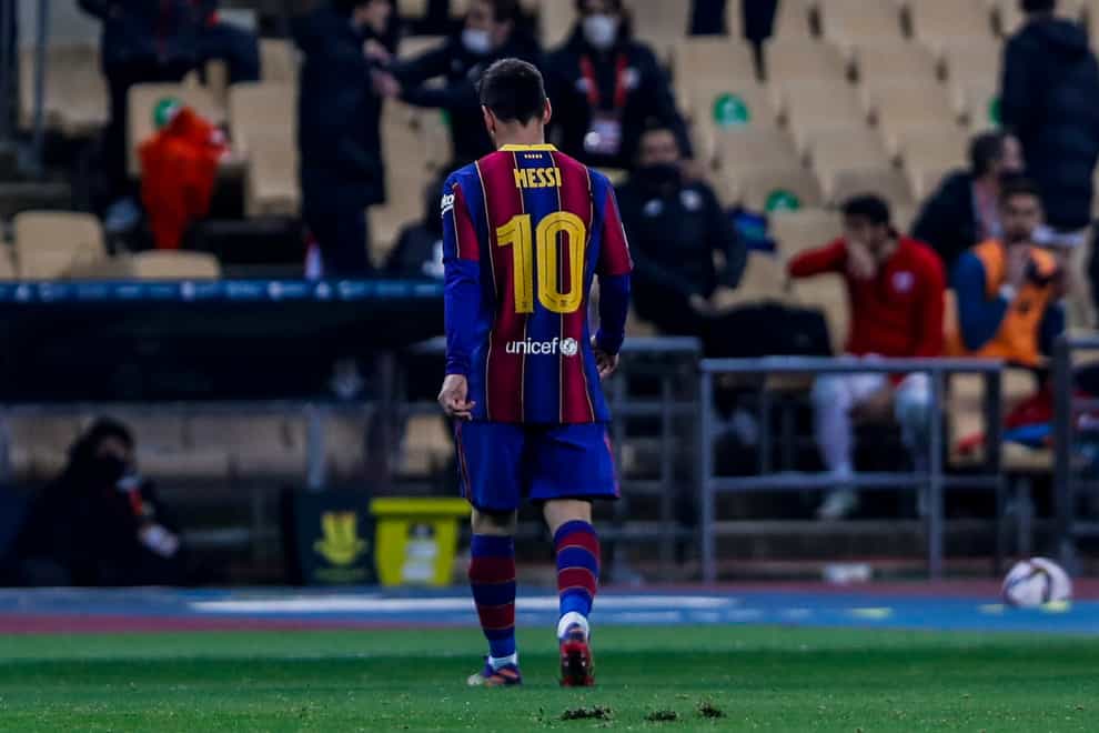 Lionel Messi walks off the pitch after receiving a red card