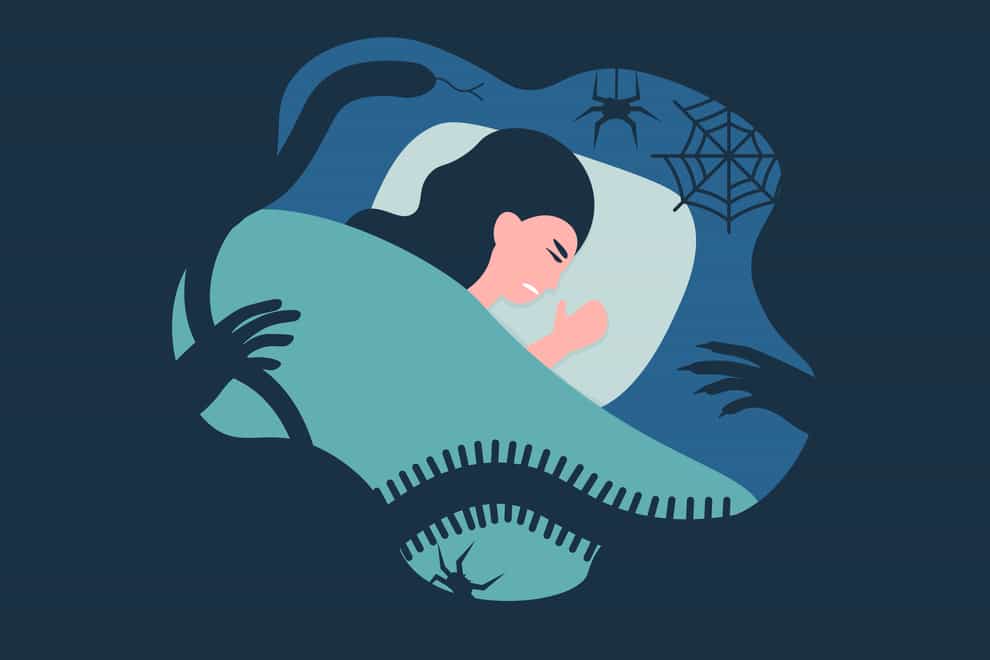 Tired woman lying in bed at night (iStock/PA)