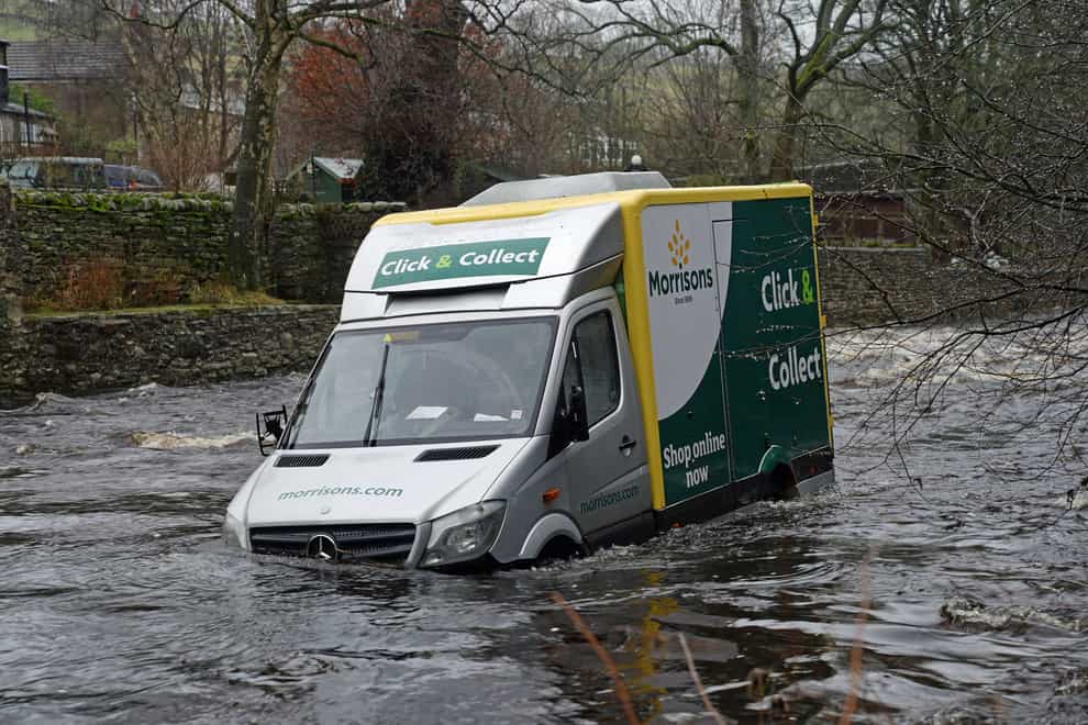 Supermarket delivery van in the River Wear