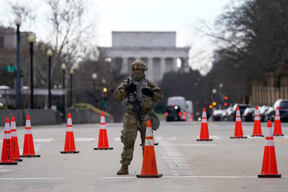 A National Guardsman stands near the US Supreme Court