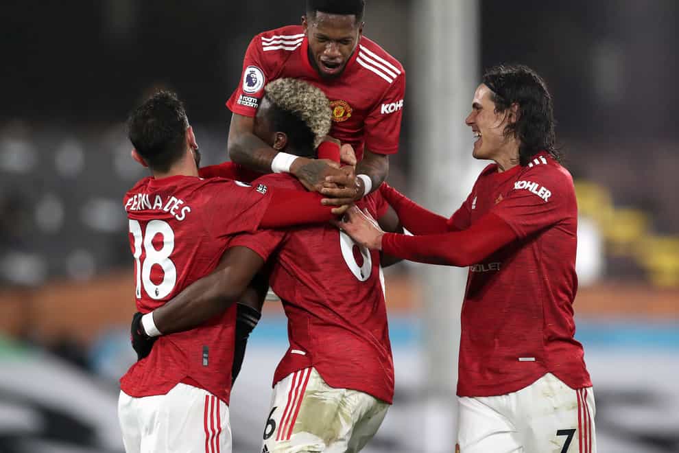 Paul Pogba is mobbed by his team-mates after scoring