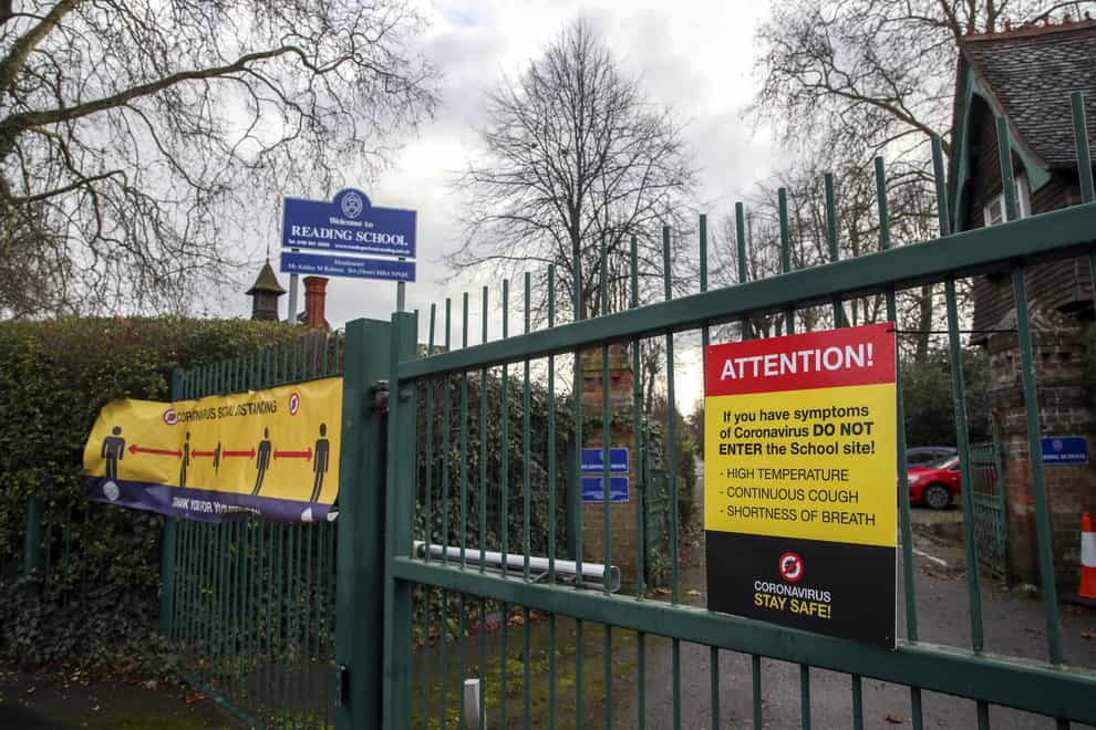 Coronavirus signs on the gates of Reading School